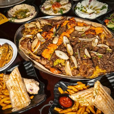 Meat Platter surrounded by various dishes.