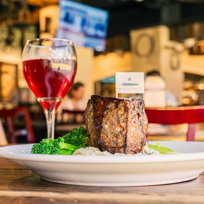 The whiskey glazed meatloaf and a drink.