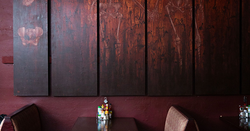 Table and a painting in the background