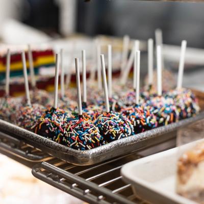 Lollipops with rainbow sprinkles.