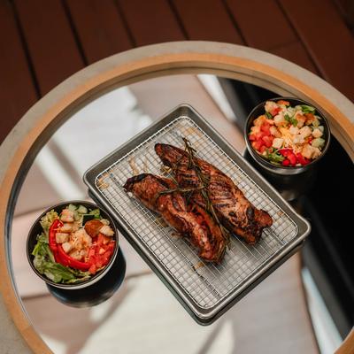 Pork roast served with salad.