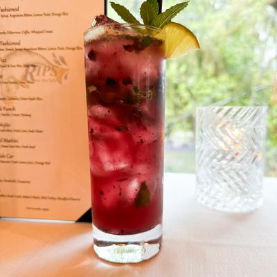 Blueberry Mojito--  rum, muddled blue berries, fresh mint, fresh lime, soda water.