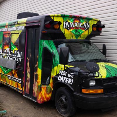Jamaican Fireside food truck parked outdoor.