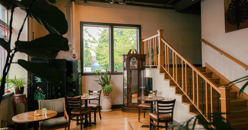 Interior, chairs and tables by the window