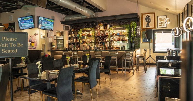 Diner tables, bar behind