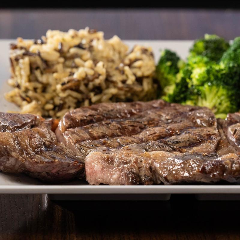 Hand - Cut Ribeye Steak* photo