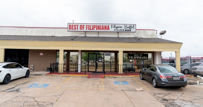 Exterior, front view to restaurant, entrance, sign above