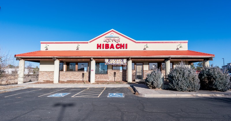 Exterior, front view to restaurant and parking lot