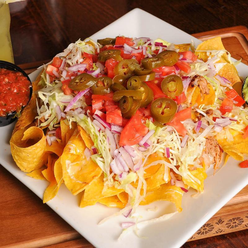 Beef Brisket, Cajun Chicken, or Spicy Beef Nachos photo