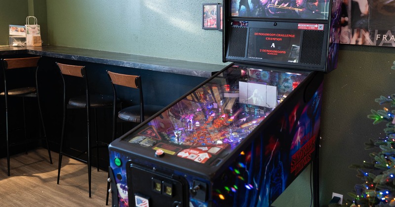 Interior, pinball near wall table