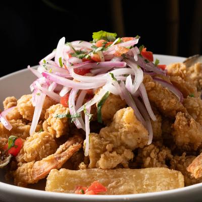 Mixed deep fried seafood, topped with Peruvian salsa and yuca fries.