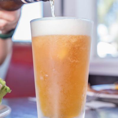 Beer being poured from a bottle