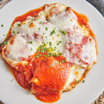 Grilled meat, cheese and tomato sauce