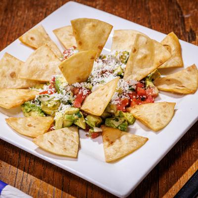 Guacamole topped with cotija cheese and served with crisp tortilla chips.