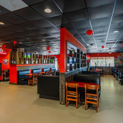 Interior featuring a distinct red and black color scheme with high-contrast dividing walls.