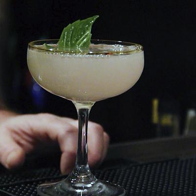 Foggy cocktail with a mint leaf
