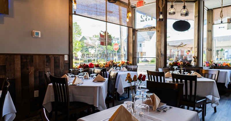 Nicely done interior dining area with set tables