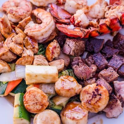 Assorted seafood and meats, close-up.