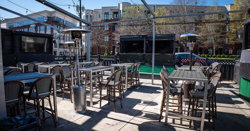 Patio, seating area, heaters and TV sets