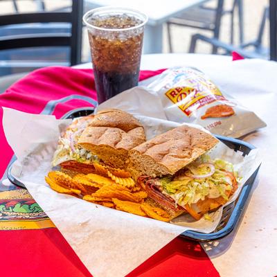 Red Bird paired with a cup of cola.