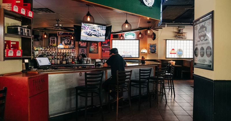Interior, bar and bar stools, guest sitting