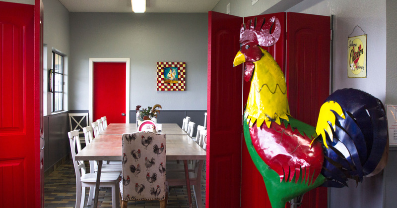 Interior, dining area set for guests