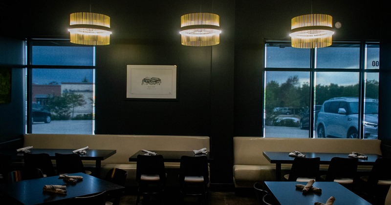 Seating booths by the windows