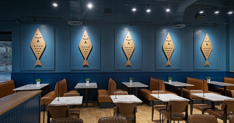 Interior, tables and chairs ready for guests