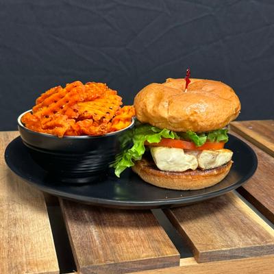 Grilled Mahi Sandwich with side sweet potato fries.