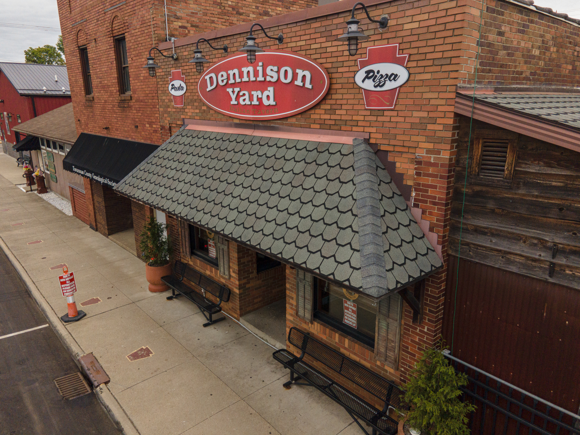 Aerial view to restaurant entrance, sign