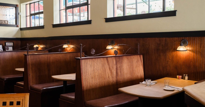 Interior, booths and tables with tableware