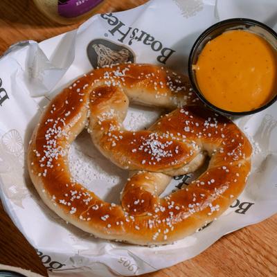Bavarian Hot Pretzel served with with beer cheese sauce.