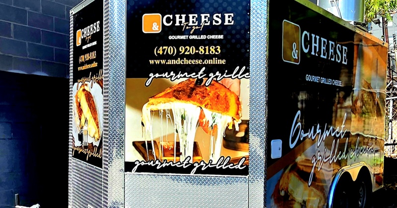 & Cheese Midtown food trailer on a sunny street