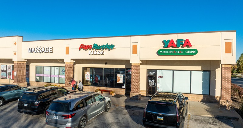 Exterior, aerial view to restaurant and parking lot