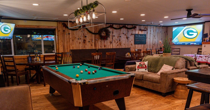 Interior, a pool table near the sofa