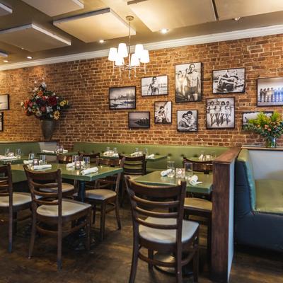Dining area decorated with pictures on the wall.