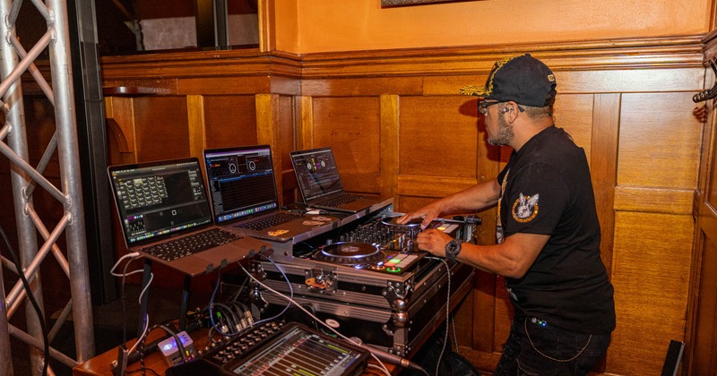 A DJ performing indoors