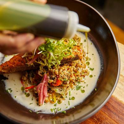 Salmon fillet, on a bed of quinoa.