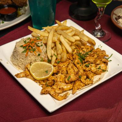 Grilled chicken, with rice and fries.