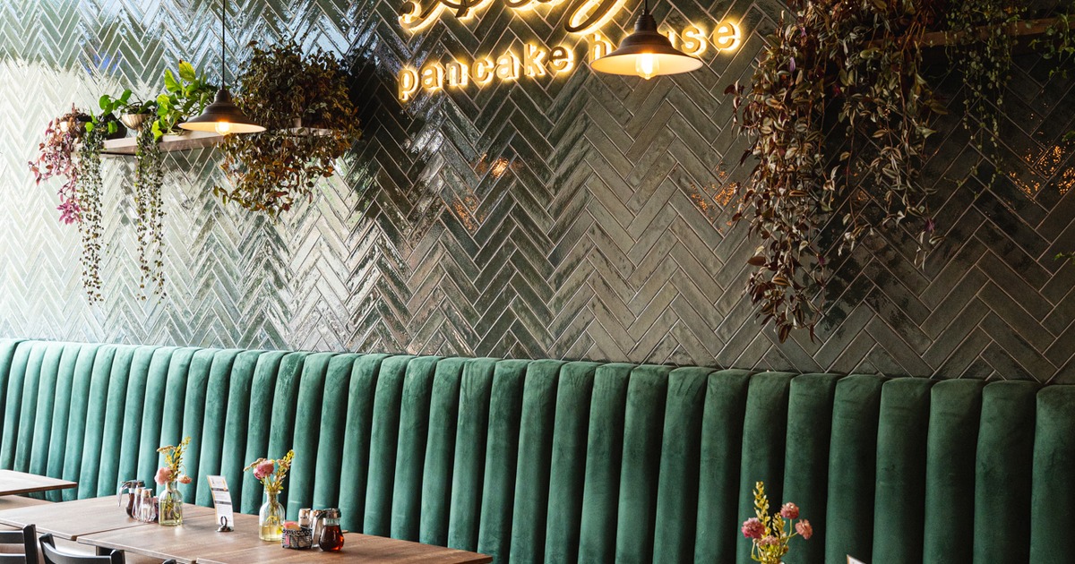 Booths, tables, light sign above