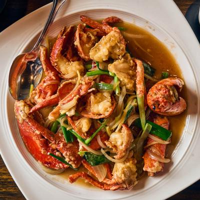 Lobster and Chinese vegetables cooked in a brown sauce.