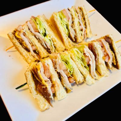 Club sandwich served on the plate.