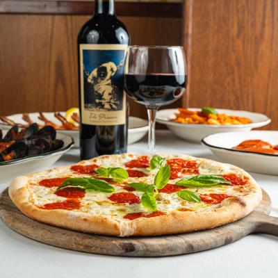 Margherita Pizza and red wine.