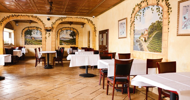 Interior, seating area with tables and chairs