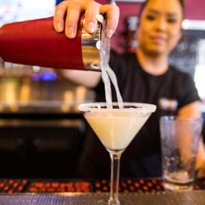 Staff member working behind the bar