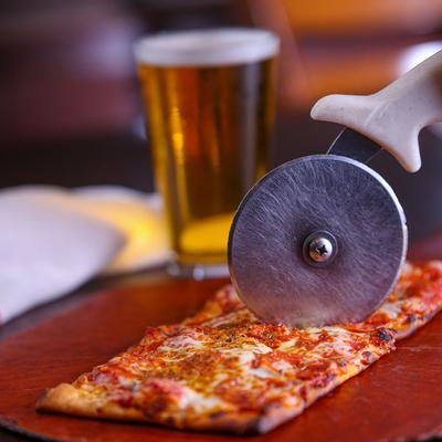 Flatbread cutting, closeup