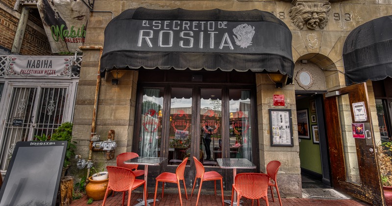 Exterior, front of restaurant, entrance, coffee tables, chairs, sidewalk