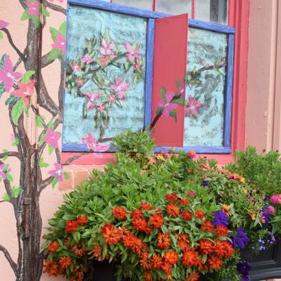 Outdoors, mural art and colorful flowers.