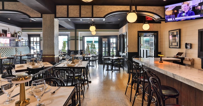 Interior seating space with tables and chairs
