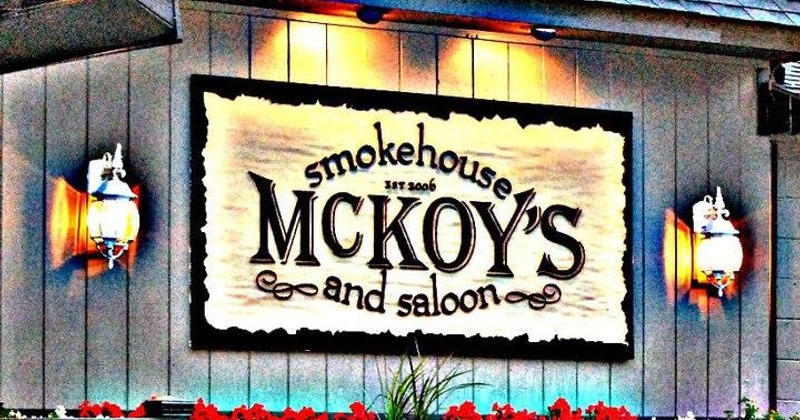 Exterior view of McKoy's Smokehouse and Saloon, sign